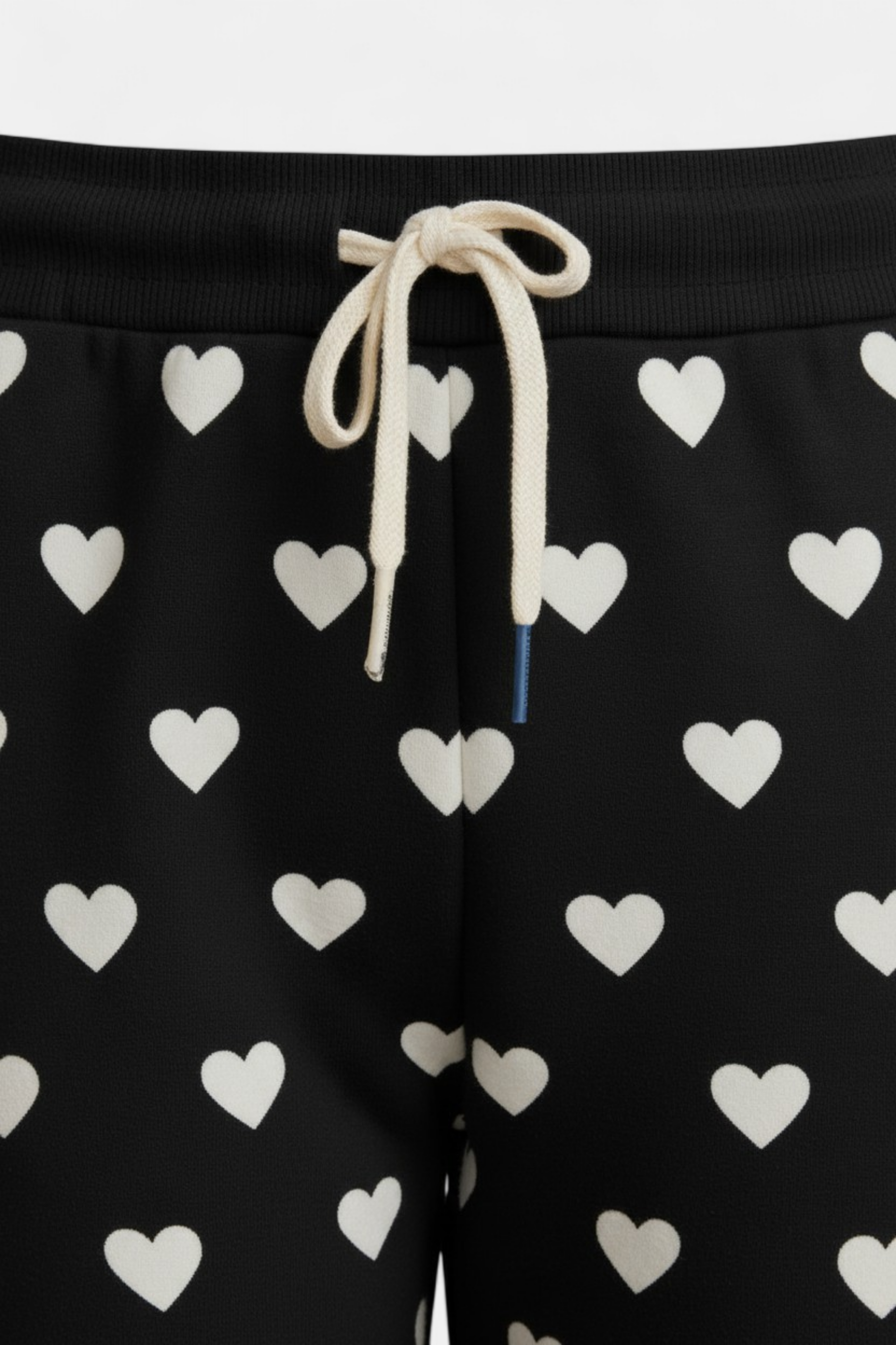 Cozy Knit Heart & Star Print Trouser side view — stylish women's wear Pakistan | MannMoji